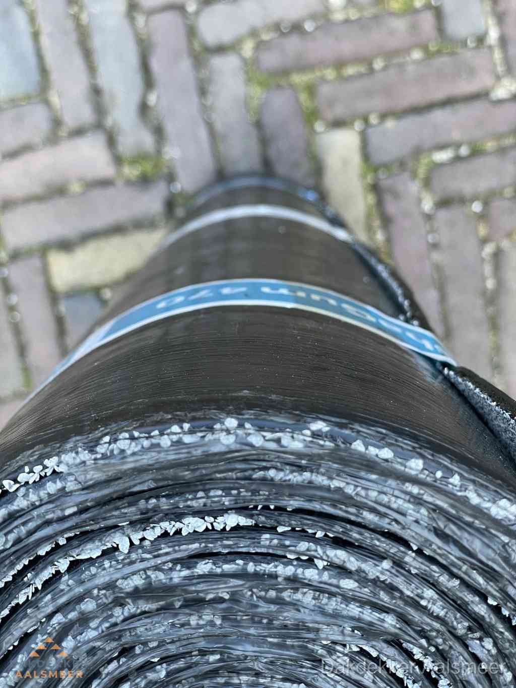 Rol bitumen dakleer met leislag voor plat dak in Aalsmeer